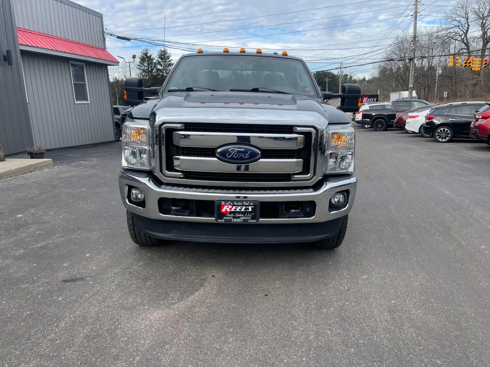 2015 Blue /Gray Ford F-350 SD XLT SuperCab Long Bed 4WD (1FT8X3B68FE) with an 6.2L V8 OHV 16V engine, 6-Speed Automatic transmission, located at 11115 Chardon Rd. , Chardon, OH, 44024, (440) 214-9705, 41.580246, -81.241943 - This 2015 Ford F-350 XLT Supercab 4WD, equipped with a robust 6.2L V8 engine and a 6-speed automatic transmission, offers substantial power and capability, suited for both work and recreational towing needs. It ensures driver comfort with a power driver's seat and power-adjustable pedals, coupled wi - Photo #1